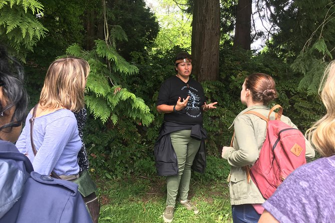 Spoken Treasures: Stanley Park Indigenous Walking Tour - Totem Poles Stop: Learning to Read the Carvings (Not Just Look at Them)