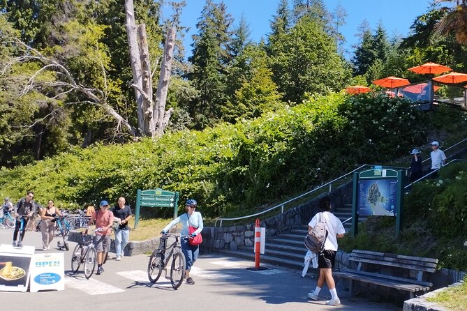 Stanley Park Bike Adventure with Lux Car Pick Up Affordable Easy - Totem Poles, Lord Stanley, and the park’s statue walk