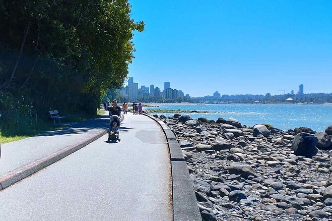 Stanley Park Bike Adventure with Lux Car Pick Up Affordable Easy - Harry Jerome, Girl in a Wetsuit, and the playful side of Stanley Park