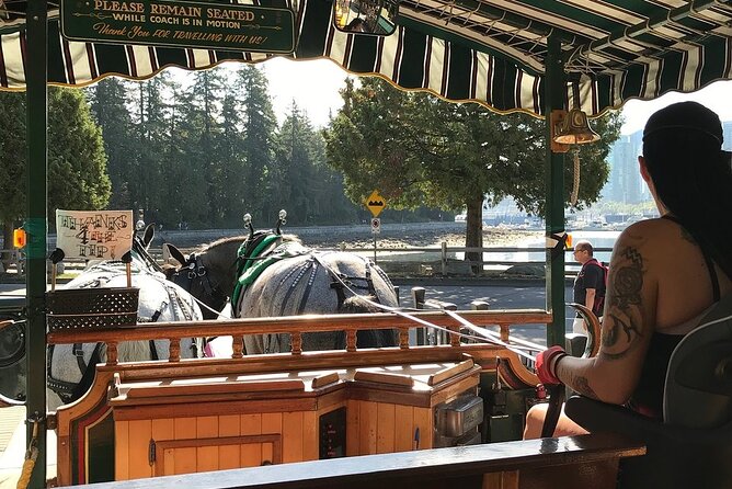 Stanley Park Horse Drawn Tour in Vancouver - Rose Garden and statue moments on the way