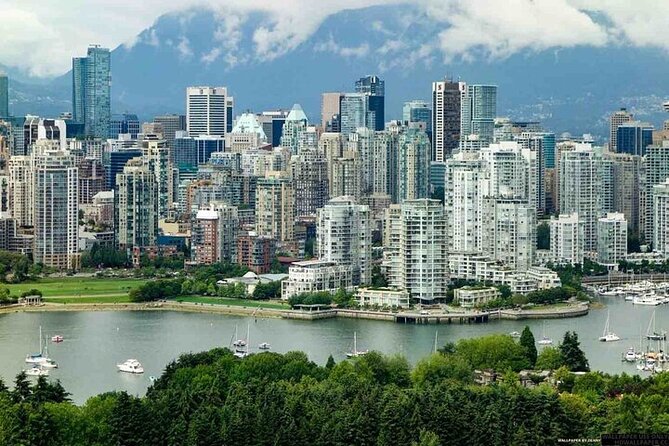 Vancouver City Tour to Experience Sea Sky and Land- private tour - English Bay: the beach, the seawall, and the Inukshuk moment