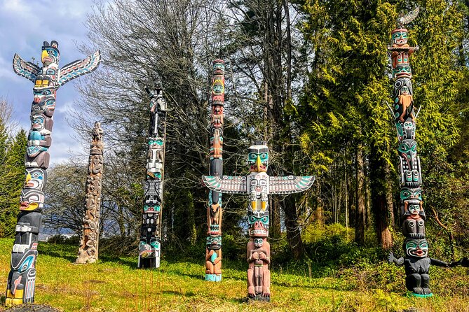 Welcome to Vancouver - Private Tour - English Bay public art: A-maz-ing Laughter, Inukshuk, and the diamond rings